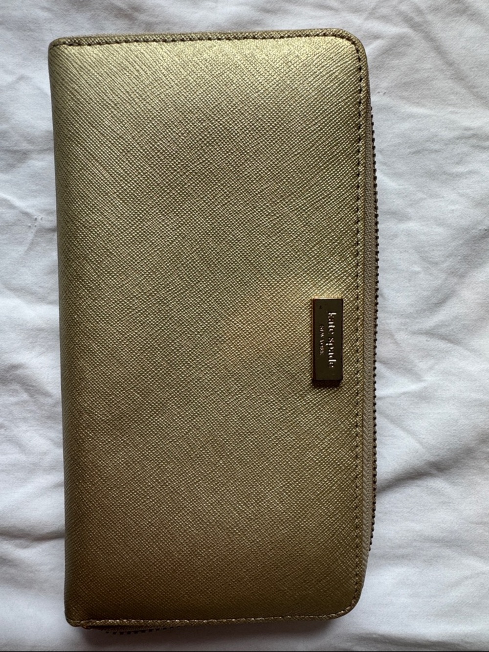 kate spade Gold Zip Around Wallet with striped multi color interior